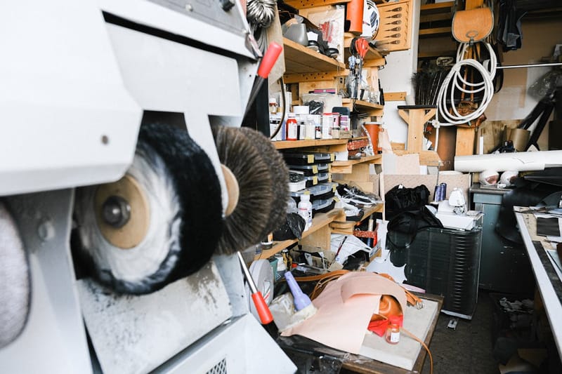 Interior of a cobbler's workshop with polishing machine